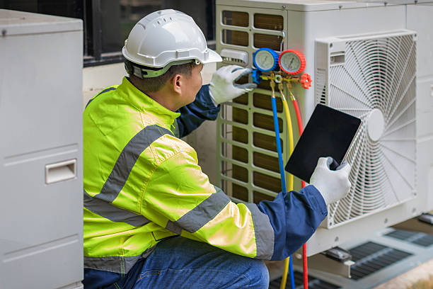 Professional Heat Pump Repair technician working in Parkville, MO